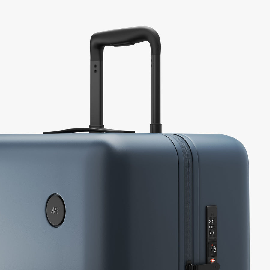 Ocean Blue | Luggage handle view of Check-In Large in Ocean Blue