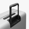 Extended luggage handle view of Check-In Large in Stellar White (thumbnail)