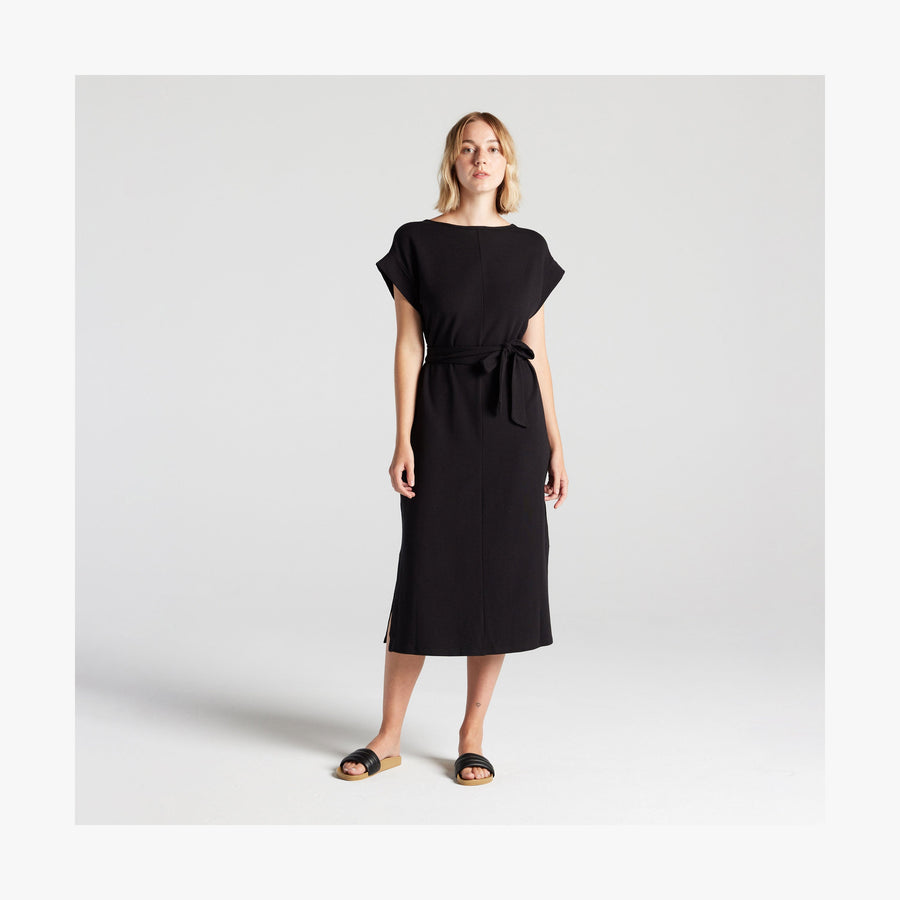 Black | Full body reversible front view of woman in Sevilla Dress Black