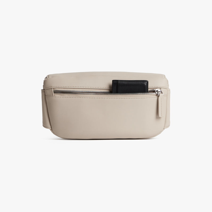 Ivory (Vegan Leather) | Back pouch view of Metro Sling in Ivory