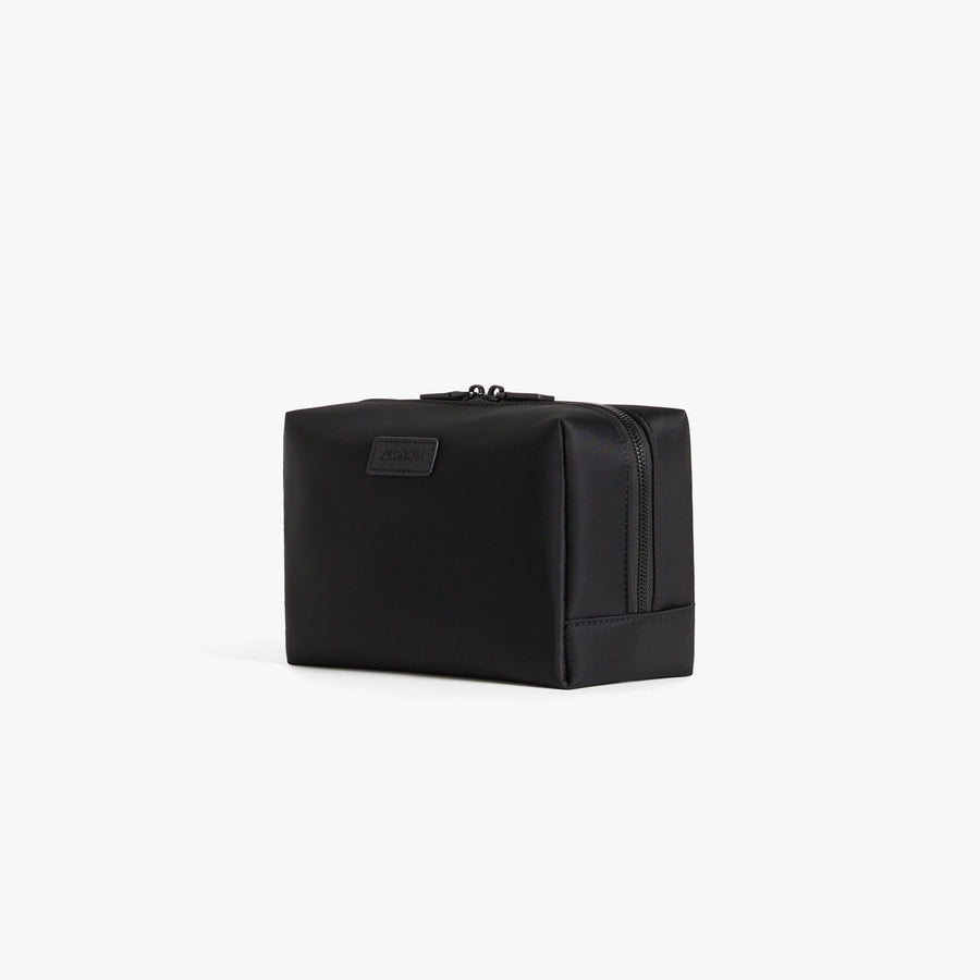 Large / Carbon Black | Angled view of Metro Toiletry Case Large in Carbon Black