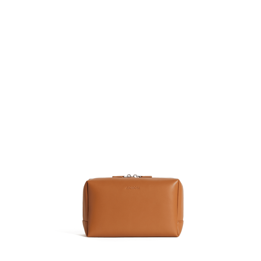Large / Saddle Tan Scaled | Front view of Metro Toiletry Case Large in Saddle Tan
