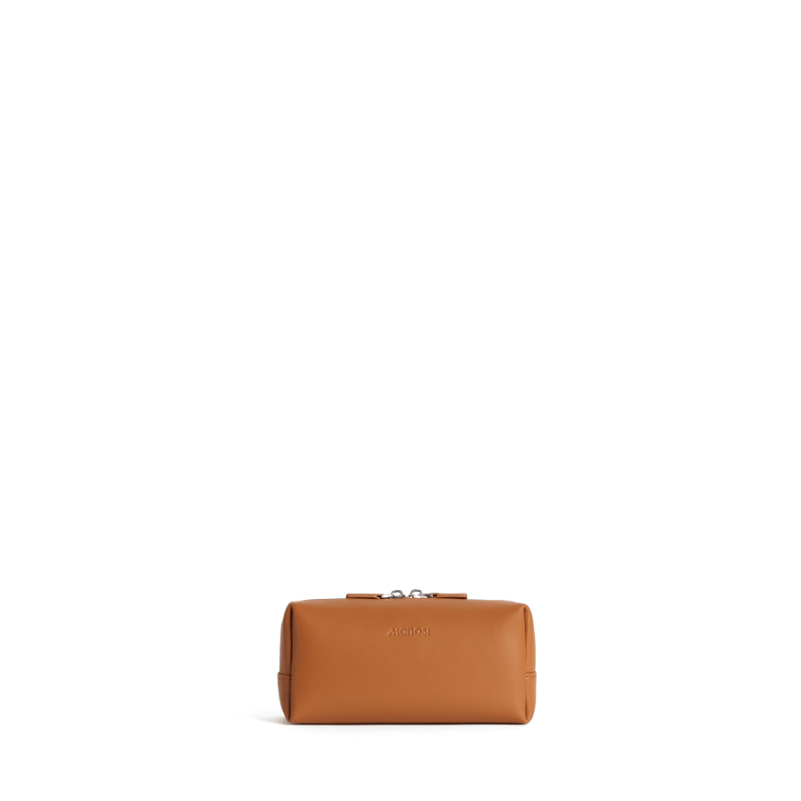 Small / Saddle Tan Scaled | Front view of Metro Toiletry Case Small in Saddle Tan