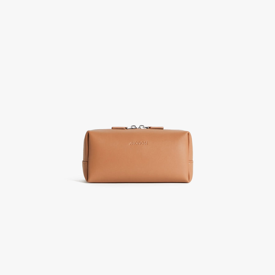 Small / Saddle Tan (Vegan Leather) Cart | Front view of Metro Toiletry Case Small in Saddle Tan